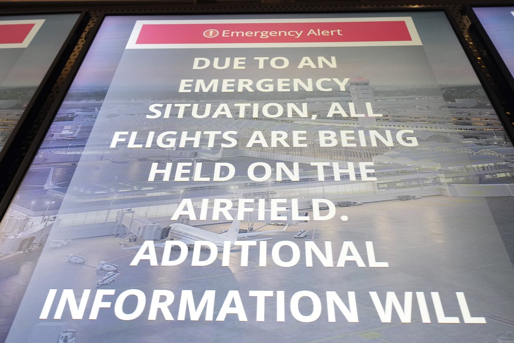 Passenger jet with 64 aboard collides with Army helicopter while landing at Reagan Airport near DC