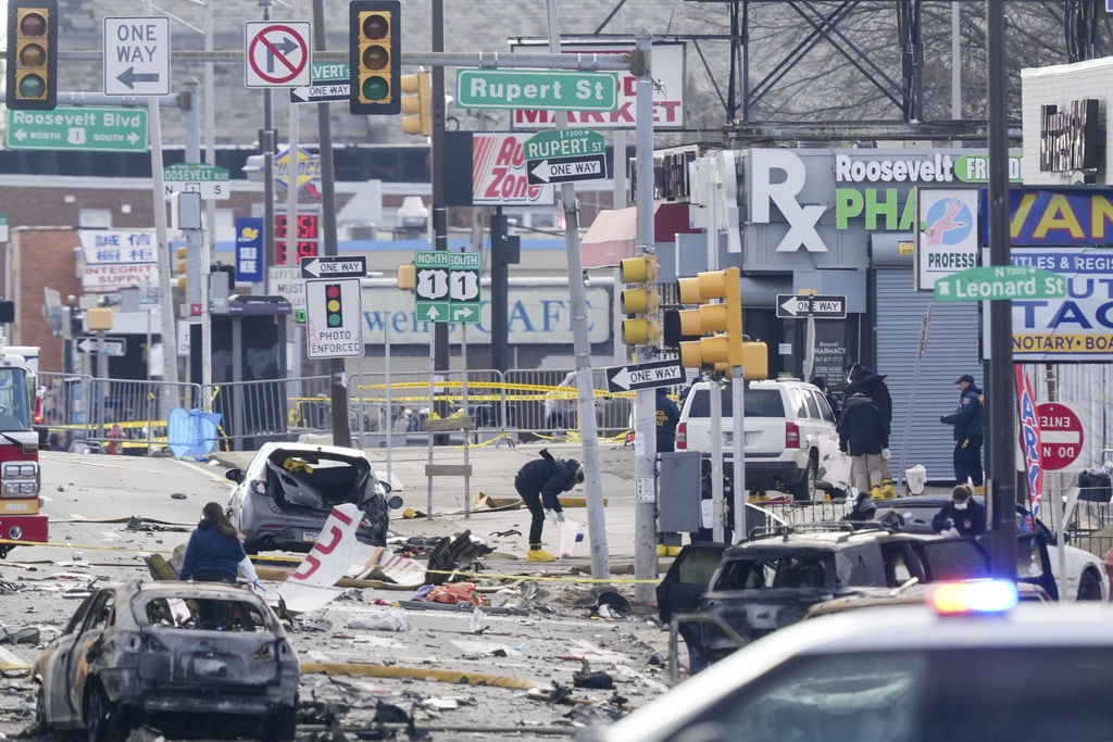Three people injured on the ground when a jet crashed in a busy Philadelphia neighborhood, killing seven people, remain in critical condition