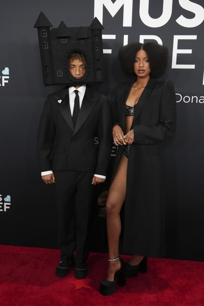 Sparkle and color pop amid more subdued tones on Grammys red carpet