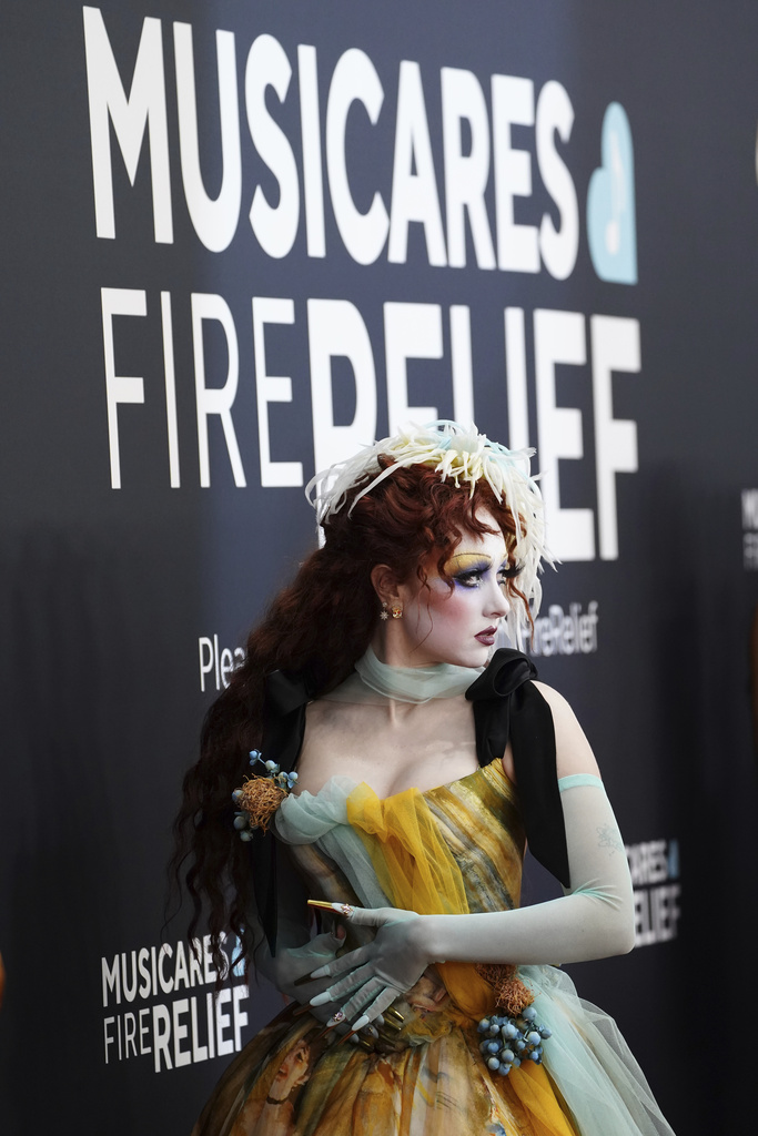 Sparkle and color pop amid more subdued tones on Grammys red carpet