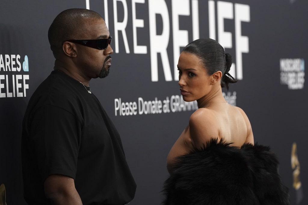 Sparkle and color pop amid more subdued tones on Grammys red carpet