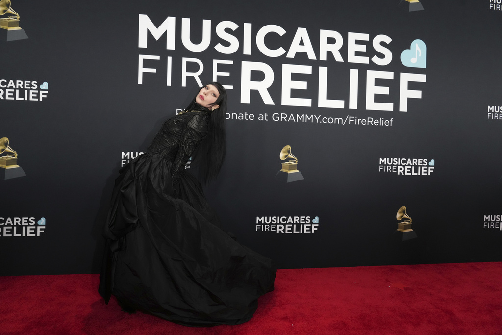 Sparkle and color pop amid more subdued tones on Grammys red carpet