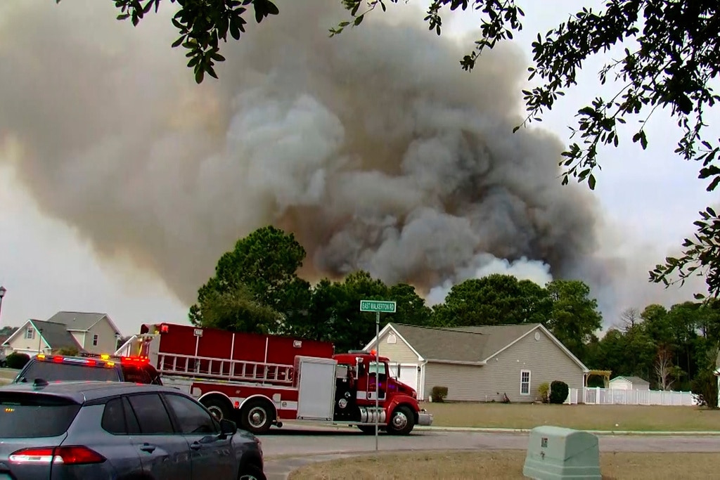 Crews battle wildfires in North and South Carolina amid dry conditions