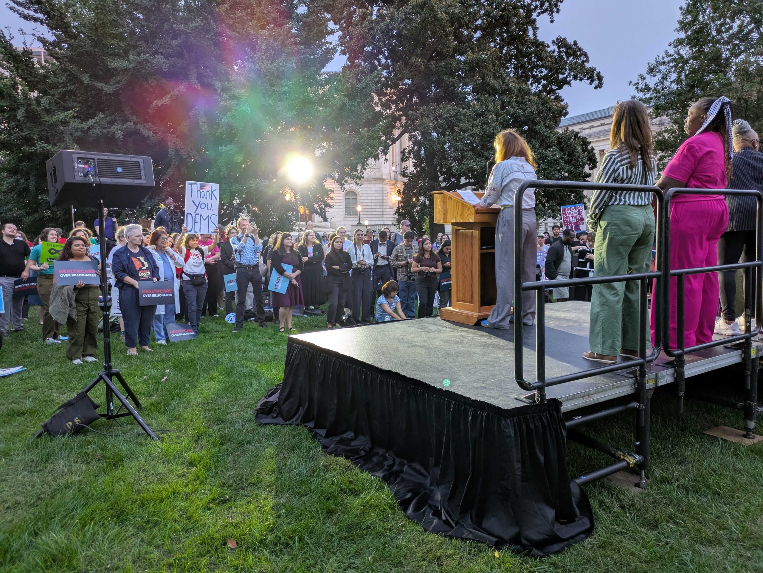 A rally-goer holds a sign reading "Thank you, Dems" at an event outside the U.S. Capitol on Tuesday, Sept. 30, 2025, where several Senate and House Democrats spoke on the issue of rising health care costs. (Photo by Ashley Murray/States Newsroom)