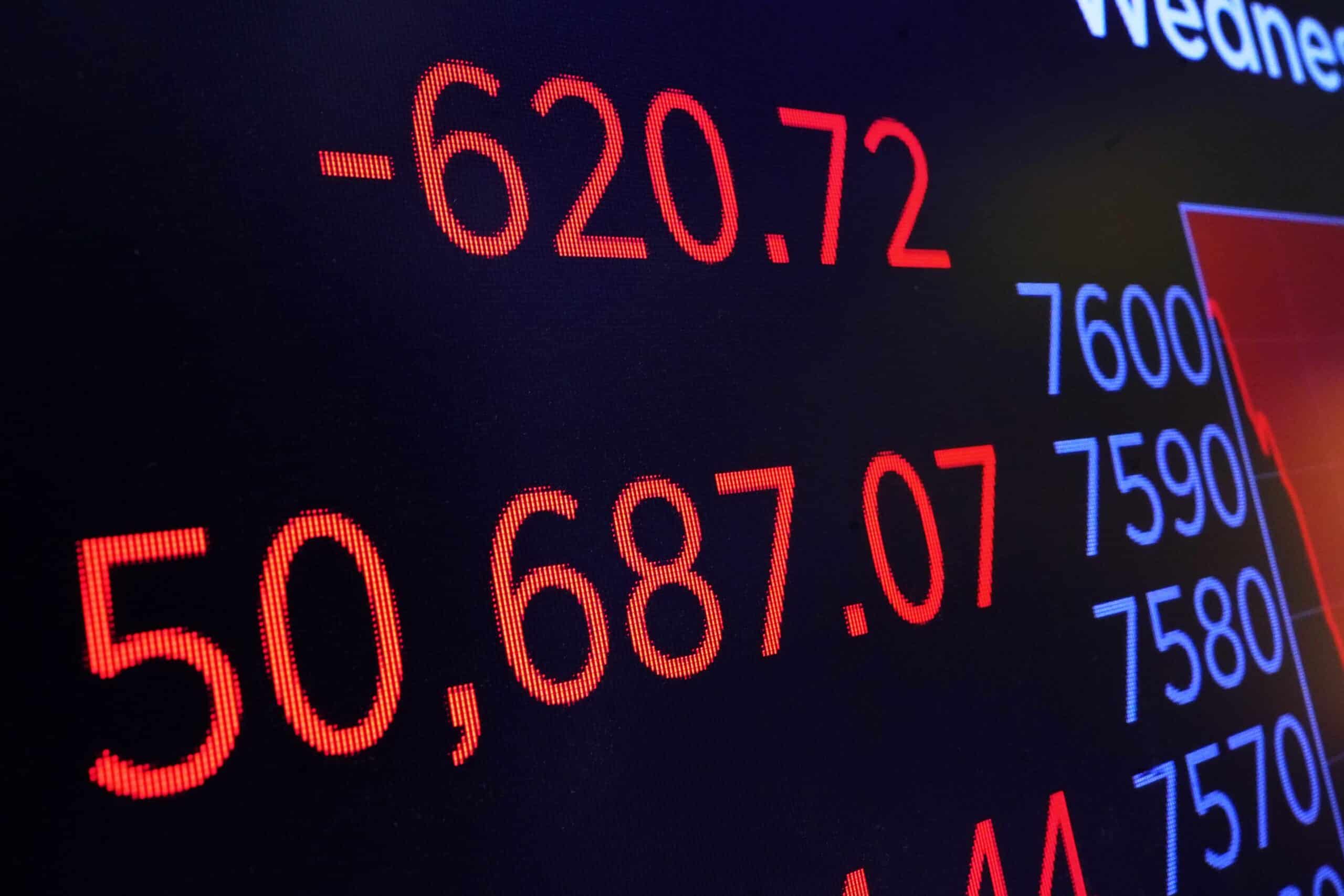 Stocks slide