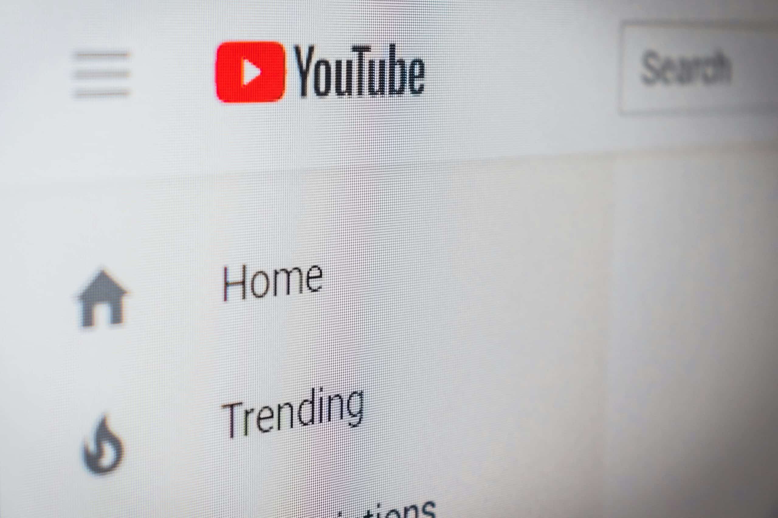 Close-up of the YouTube homepage menu on a screen, a view advertisers see when planning YouTube ad placements and campaigns.